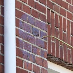 Protection hydrofuge avec effet perlant pour façades